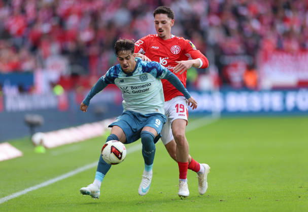 10.10.2026, Fussball Bundesliga, 1. FSV Mainz 05 - Bayer 04 Leverkusen, v.l., Afonso Moreira (Bayer 04 Leverkusen), Anthony Caci (FSV Mainz 05) DFL DFB REGULATIONS PROHIBIT ANY USE OF PHOTOGRAPHS AS IMAGE SEQUENCES AND OR QUASI-VIDEO. xdcx Copyright: HMBxMedia Claus