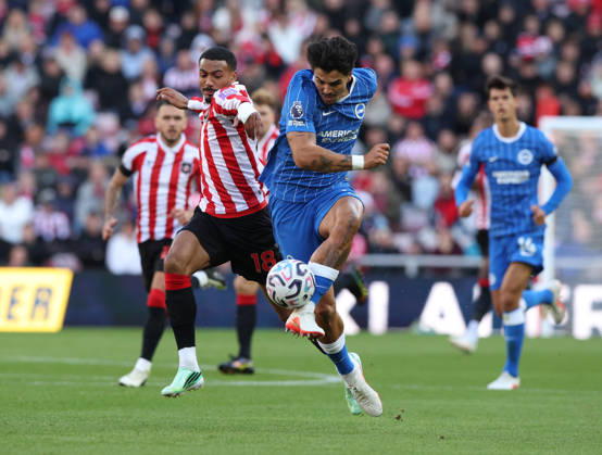 Sunderland, England, 10th October 2026. Wilson Isidor (L) of Sunderland in action with Pascal Gross of Brighton and Hove Albion during the Sunderland vs Brighton and Hove Albion Premier League match at the Stadium Of Light, Sunderland. Picture credit should read: Nigel Roddis Sportimage EDITORIAL USE ONLY. No use with unauthorised audio, video, data, fixture lists, club league logos or live services. Online in-match use limited to 120 images, no video emulation. No use in betting, games or single club league player publications. SPI_009_NR_SUND_BRIG SPI-5059-0009