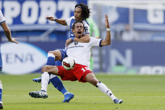 v.l.n.r.: Koki Machida (TSG Hoffenheim) und Yussuf Poulsen (HSV), im Bundesliga-Spiel zwischen der TSG 1899 Hoffenheim und dem Hamburger SV in der PreZero Arena, Sinsheim, Deutschland, am 10. Oktober 2026. in action during the Bundesliga match between TSG 1899 Hoffenheim and Hamburger SV at the PreZero Arena, Sinsheim, Germany, on October 10, 2026. DFB DFL REGULATIONS PROHIBIT ANY USE OF PHOTOGRAPHS AS IMAGE SEQUENCES AND OR QUASI-VIDEO, Copyright: HMBxMedia xHeikoxBecker