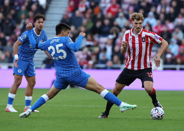 Sunderland, England, 10th October 2026. Thomas Meunier (R) of Sunderland in action with Diego Gomez of Brighton during the Sunderland vs Brighton and Hove Albion Premier League match at the Stadium Of Light, Sunderland. Picture credit should read: Nigel Roddis Sportimage EDITORIAL USE ONLY. No use with unauthorised audio, video, data, fixture lists, club league logos or live services. Online in-match use limited to 120 images, no video emulation. No use in betting, games or single club league player publications. SPI_012_NR_SUND_BRIG SPI-5059-0012