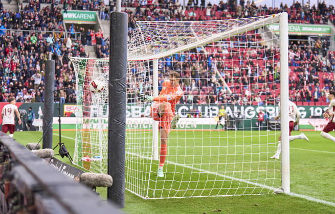 Robin Fellhauer of Augsburg scoring the 1-0 goal after 8,4 seconds and after a big mistake of Manuel Neuer, goalkeeper of FC Bayern München , Head coach Vincent Kompany of Bayern München disappointed in the background during the match FC AUGSBURG - FC BAYERN MÜNCHEN on October 10, 2026 at WWK Arena Augsburg, Germany. Season 2026 2027, 1.Bundesliga, FCB,