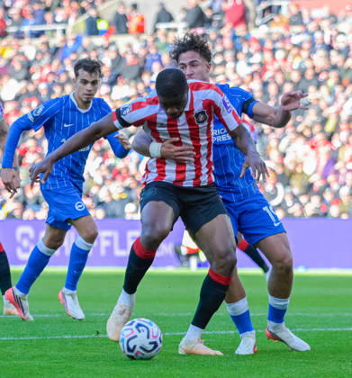 Sunderland v Brighton, Premier League, Football, Stadium Of Light, Sunderland UK - 10 Oct 2026 Sunderland battling with Charalampos Kostoulas of Brighton & Hove Albion Football Club Sunderland Stadium Of Light Tyne and Wear UK, UK NEWSPAPERS OUT Copyright: xAdamxCookx