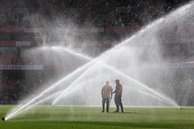 Arsenal v Leeds United 10 October 2026, London - Premier League Football - Arsenal v Leeds United - Groundskeepers stand amongst the pitch sprinklers - Photo: Charlotte Wilson Offside. London UK Copyright: xCharlottexWilsonx xOffsidexOffside
