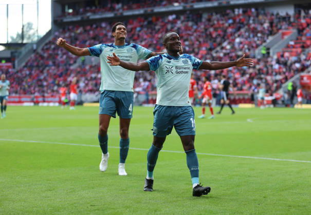 10.10.2026, Fussball Bundesliga, 1. FSV Mainz 05 - Bayer 04 Leverkusen, v.l., Torjubel zum 2:4 durch Moussa Diaby (Bayer 04 Leverkusen), Goal celebration, celebrate the goal, Jarell Quansah (Bayer 04 Leverkusen) DFL DFB REGULATIONS PROHIBIT ANY USE OF PHOTOGRAPHS AS IMAGE SEQUENCES AND OR QUASI-VIDEO. xdcx Copyright: HMBxMedia Claus