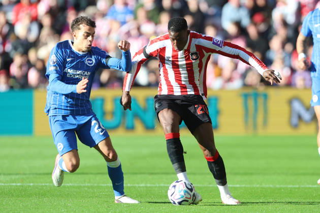 10th October 2026; Stadium of Light, Sunderland, England; Premier League Football, Sunderland versus Brighton and Hove Albion; Nordi Mukiele of Sunderland holds off Yasin Ayari of Brighton and Hove Albion DavexLofthouse