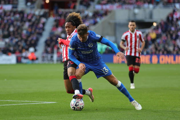 10th October 2026; Stadium of Light, Sunderland, England; Premier League Football, Sunderland versus Brighton and Hove Albion; Malick Fofana of Sunderland makes a tackle on Pascal Gross of Brighton and Hove Albion DavexLofthouse