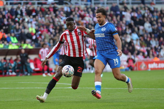 10th October 2026; Stadium of Light, Sunderland, England; Premier League Football, Sunderland versus Brighton and Hove Albion; Nordi Mukiele of Sunderland challenges Charalampos Kostoulas of Brighton and Hove Albion for the ball DavexLofthouse