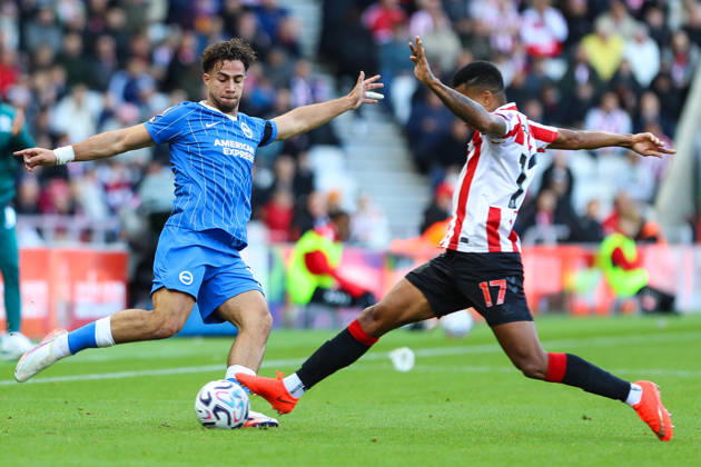SUNDERLAND, ENGLAND, OCTOBER 10: Charalampos Kostoulas of Brighton & Hove Albion (L) is tackled by Reinildo Mandava of Sunderland AFC (R) during a Premier League 2026-27 match between Sunderland AFC and Brighton & Hove Albion at the Stadium of Light on October 10, 2026 in Sunderland, England. (Photo by Zach Forster Sports Press Photo) Copyright: xZachxForster SportsxPressxPhotox Sportspressphoto_SPR250877