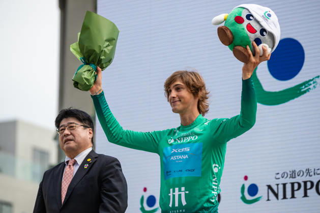 Tour De Kyushu Stage Finishes In Fukuoka s Tenjin For The First Time Matteo Malucelli of XDS Astana Team wins Stage 1 of the Mynavi Tour de Kyushu 2026 at the finish line on Tenjin Bridge in Fukuoka, Japan, on October 10, 2026. The Italian won the 152.0-kilometer Saga-Fukuoka stage in 3 hours 9 minutes 51 seconds, ahead of Luke Mudgway (Li Ning Star) and Alessio Delle Vedove (XDS Astana Team), and took the general and points classification leads. It was the first time the race finished in Tenjin, the commercial heart of Fukuoka, where a parade, stage events and food stalls marked the day. The race, first held in 2023 and part of the UCI Asia Tour (2.1 category), runs October 9-12 through six Kyushu prefectures under the official title We stand with Kumamoto. Mynavi Tour de Kyushu 2026, adopted to support areas affected by the Kumamoto earthquake. Fukuoka Japan Copyright: xRyoxChix originalFilename:zhi-tourdeky261010_np6um.jpg