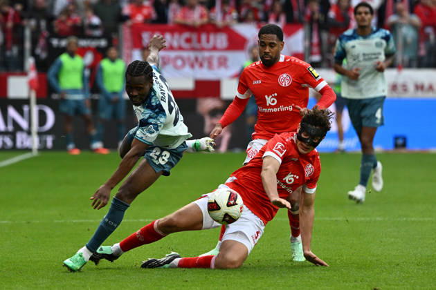 10.10.2026, xsltx, Fussball 1.Bundesliga, FSV Mainz 05 - Bayer 04 Leverkusen v.l. Fabio Gruber (FSV Mainz 05) Nathan Tella (Bayer 04 Leverkusen) Zweikampf, Aktion, action, battle for the ball (DFL DFB REGULATIONS PROHIBIT ANY USE OF PHOTOGRAPHS as IMAGE SEQUENCES and or QUASI-VIDEO) Mainz