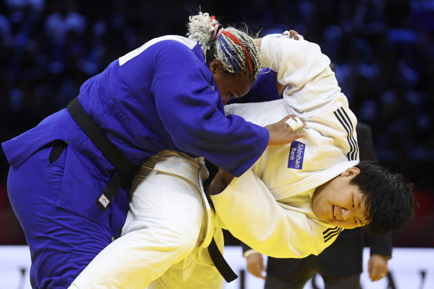 AZERBAIJAN, BAKU - OCTOBER 10, 2026: South Korea s Lee Hyeon-ji (R) and France s Romane Dicko fight in their heavyweight bout during the 2026 World Judo Championships at the National Gymnastics Arena. Mikhail Sinitsyn TASS  99046676