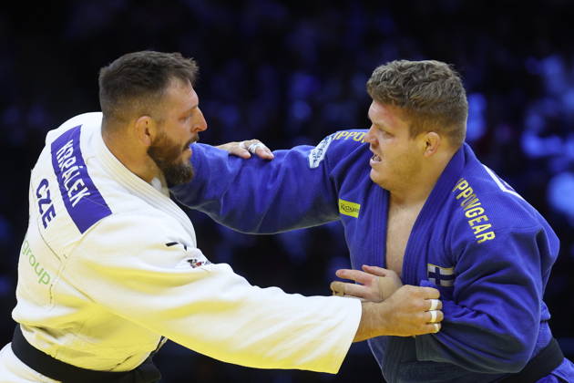 AZERBAIJAN, BAKU - OCTOBER 10, 2026: Czechia s Lukas Krpalek (L) and Finland s Martti Puumalainen fight in their heavyweight bout during the 2026 World Judo Championships at the National Gymnastics Arena. Mikhail Sinitsyn TASS 99047149
