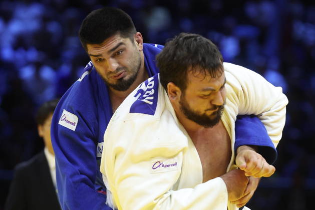 AZERBAIJAN, BAKU - OCTOBER 10, 2026: Azerbaijan s Dzhamal Gamzatkhanov (L) and Kanan Nasibov fight in their heavyweight bout during the 2026 World Judo Championships at the National Gymnastics Arena. Mikhail Sinitsyn TASS  99048143