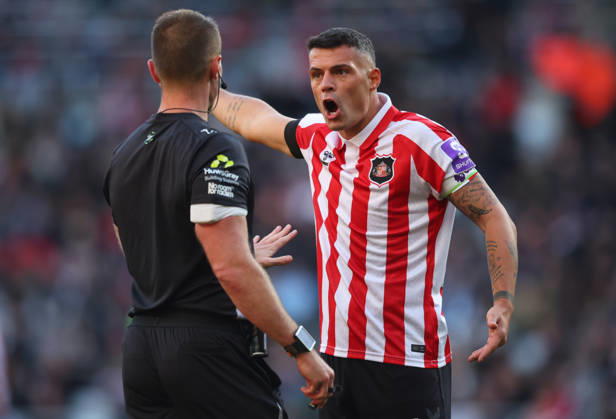 Sunderland v Brighton and Hove Albion - Premier League 2026 27 Granit Xhaka of Sunderland complains to referee Thomas Bramall during the Premier League 2026 27 match between Sunderland and Brighton & Hove Albion at Stadium of Light on October 10, 2026 in Sunderland, England. WARNING! This Photograph May Only Be Used For Newspaper And Or Magazine Editorial Purposes. May Not Be Used For Publications Involving 1 player, 1 Club Or 1 Competition Without Written Authorisation From Football DataCo Ltd. For Any Queries, Please Contact Football DataCo Ltd on +44 (0) 207 864 9121 Sunderland Stadium of Light England United Kingdom Copyright: xAllstarxPicturexLibraryxLtdx