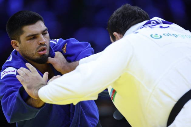AZERBAIJAN, BAKU - OCTOBER 10, 2026: Azerbaijan s Dzhamal Gamzatkhanov (L) and Kanan Nasibov fight in their heavyweight bout during the 2026 World Judo Championships at the National Gymnastics Arena 2026 World Judo Championships In Baku  - ZUMAt113 20261010_zaa_t113_408 Copyright: xMikhailxSinitsynx