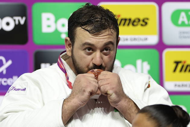 AZERBAIJAN, BAKU - OCTOBER 10, 2026: Azerbaijan s Kanan Nasibov celebrates his bronze medal during a victory ceremony for the men s heavyweight event as the 2026 World Judo Championships takes place at the National Gymnastics Arena. Mikhail Sinitsyn TASS  99049389