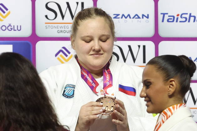 AZERBAIJAN, BAKU - OCTOBER 10, 2026: Russia s Maria Ivanova celebrates her gold medal during a victory ceremony for the women s heavyweight event as the 2026 World Judo Championships takes place at the National Gymnastics Arena. Mikhail Sinitsyn TASS 99050280