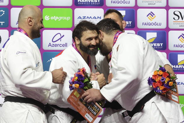 AZERBAIJAN, BAKU - OCTOBER 10, 2026: Azerbaijan s Ushangi Kokauri, Russia s Inal Tasoev and Azerbaijan s Kanan Nasibov (L-R) celebrate their silver, gold and bronze medals respectively during a victory ceremony for the men s heavyweight event as the 2026 World Judo Championships takes place at the National Gymnastics Arena. Mikhail Sinitsyn TASS 99050477
