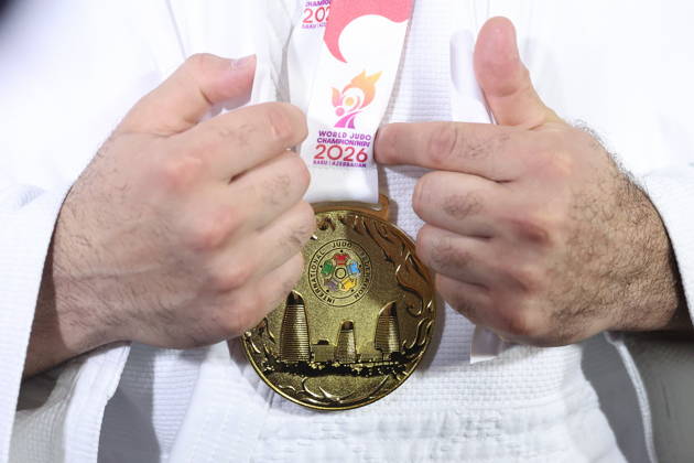 AZERBAIJAN, BAKU - OCTOBER 10, 2026: Russia s Inal Tasoev celebrates his gold medal during a victory ceremony for the men s heavyweight event as the 2026 World Judo Championships takes place at the National Gymnastics Arena. Mikhail Sinitsyn TASS 99051658