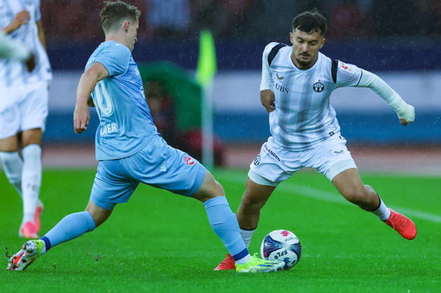 FC Zürich gegen FC Thun Brack Super League 10. Oktober 2026 Nico Maier (30, FC Thun, li.) im Zweikampf mit Bledian Krasniqi (7, FC Zürich) wahrend dem Fussballspiel Brack Super League, FC Zürich gegen FC Thun, 10. Oktober 2026, Stadion Letzigrund, Zürich, Schweiz. Zürich Stadion Letzigrund Zürich Schweiz