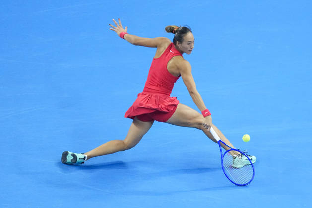 (261010) -- BEIJING, Oct. 10, 2026 -- Zheng Qinwen hits a return during the women s singles semifinal between Zheng Qinwen of China and Elise Mertens of Belgium at 2026 China Open tennis tournament in Beijing, China, Oct. 10, 2026. ) (SP)CHINA-BEIJING-TENNIS-CHINA OPEN-WOMEN S SINGLES-SEMIFINAL (CN) JuxHuanzong