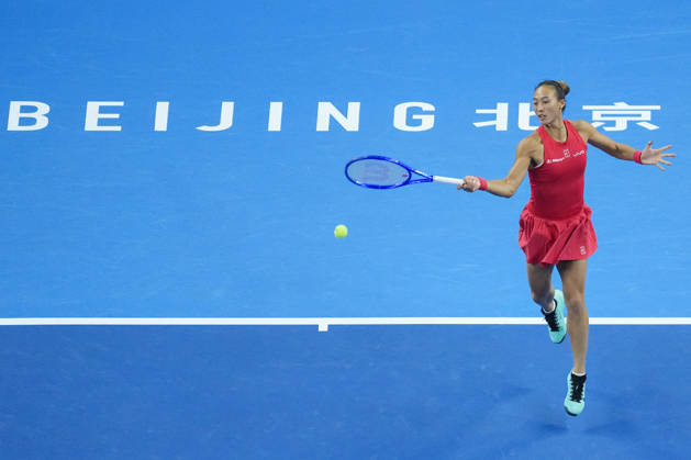 (261010) -- BEIJING, Oct. 10, 2026 -- Zheng Qinwen hits a return during the women s singles semifinal between Zheng Qinwen of China and Elise Mertens of Belgium at 2026 China Open tennis tournament in Beijing, China, Oct. 10, 2026. ) (SP)CHINA-BEIJING-TENNIS-CHINA OPEN-WOMEN S SINGLES-SEMIFINAL (CN) JuxHuanzong