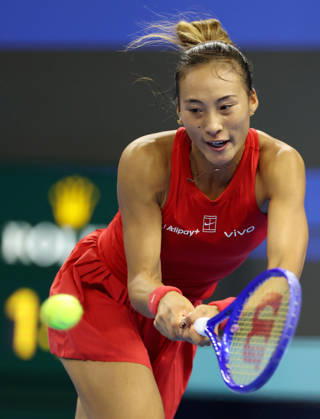 (261010) -- BEIJING, Oct. 10, 2026 -- Zheng Qinwen hits a return during the women s singles semifinal between Zheng Qinwen of China and Elise Mertens of Belgium at 2026 China Open tennis tournament in Beijing, China, Oct. 10, 2026. ) (SP)CHINA-BEIJING-TENNIS-CHINA OPEN-WOMEN S SINGLES-SEMIFINAL (CN) ZhangxChenlin
