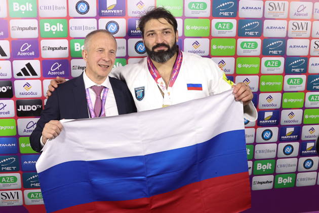 AZERBAIJAN, BAKU - OCTOBER 10, 2026: Sergei Soloveychik (L), President of the Russian Judo Federation, poses with judoka Inal Tasoev to celebrate the latter s gold medal during a victory ceremony for the men s heavyweight event as the 2026 World Judo Championships takes place at the National Gymnastics Arena. Mikhail Sinitsyn TASS  99051896