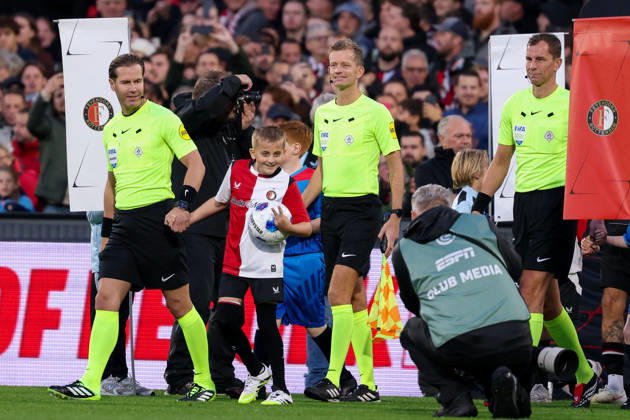 2026-10-10 Feyenoord v AZ Alkmaar - Dutch Eredivisie ROTTERDAM, NETHERLANDS - OCTOBER 10: Referee Danny Makkelie, Assistant referee Jan de Vries, Assistant referee Hessel Steegstra enter the pitch during the Dutch Eredivisie match between Feyenoord and AZ Alkmaar at Stadion Feijenoord on October 10, 2026 in Rotterdam, Netherlands. Rotterdam Stadion Feijenoord Netherlands Content not available for redistribution in The Netherlands directly or indirectly through any third parties. Copyright: xHansxvanxderxValkx