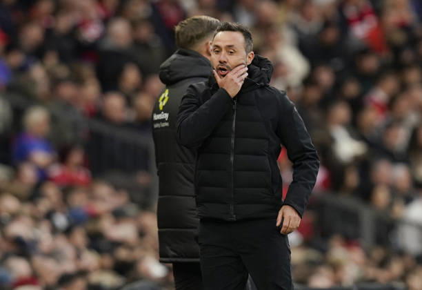 Manchester, England, 10th October 2026. Roberto De Zerbi coach of Tottenham reacts during the Manchester United, ManU vs Tottenham Hotspur Premier League match at Old Trafford, Manchester. Picture credit should read: Andrew Yates Sportimage EDITORIAL USE ONLY. No use with unauthorised audio, video, data, fixture lists, club league logos or live services. Online in-match use limited to 120 images, no video emulation. No use in betting, games or single club league player publications. SPI_030_AY_MANUTD_SPURS SPI-5058-0030