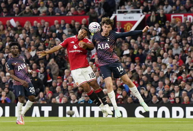 Manchester, England, 10th October 2026. Youri Tielemans of Manchester United, ManU tussles with Archie Gray of Tottenham during the Manchester United vs Tottenham Hotspur Premier League match at Old Trafford, Manchester. Picture credit should read: Andrew Yates Sportimage EDITORIAL USE ONLY. No use with unauthorised audio, video, data, fixture lists, club league logos or live services. Online in-match use limited to 120 images, no video emulation. No use in betting, games or single club league player publications. SPI_035_AY_MANUTD_SPURS SPI-5058-0035