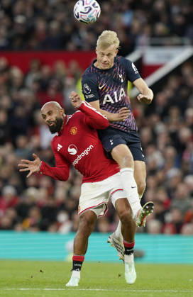 Manchester, England, 10th October 2026. Jan Paul van Hecke of Tottenham tussles with Bryan Mbeumo of Manchester United, ManU during the Manchester United vs Tottenham Hotspur Premier League match at Old Trafford, Manchester. Picture credit should read: Andrew Yates Sportimage EDITORIAL USE ONLY. No use with unauthorised audio, video, data, fixture lists, club league logos or live services. Online in-match use limited to 120 images, no video emulation. No use in betting, games or single club league player publications. SPI_043_AY_MANUTD_SPURS SPI-5058-0043