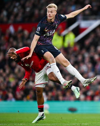 MANCHESTER, ENGLAND, OCT 10: Bryan Mbeumo of Manchester United, ManU is challenged by Jan Paul van Hecke of Tottenham Hotspur during the Premier League match between Manchester United and Tottenham Hotspur at Old Trafford in Manchester, England (Will Palmer Sports Press Photo) Copyright: xWillxPalmer SportsxPressxPhotox Sportspressphoto_SPR251398