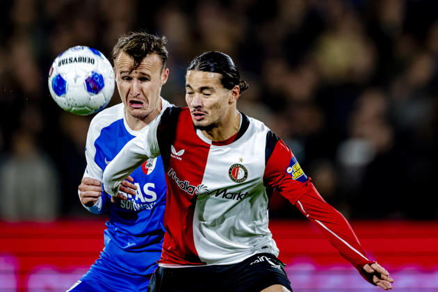 ROTTERDAM - AZ Alkmaar midfielder Peer Koopmeiners and SC Feyenoord Rotterdam forward Anis Hadj Moussa during the Vriendenloterij Eredivisie match between Feyenoord and AZ at De Kuip on 10 October 2026 in Rotterdam, Nederland. (Photo by DeFodi Images) -