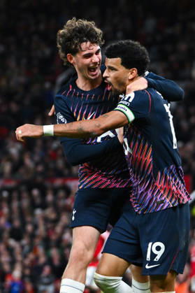 MANCHESTER, ENGLAND, OCT 10: Dominic Solanke of Tottenham Hotspur celebrates with teammate Archie Gray after scoring his sides first goal during the Premier League match between Manchester United, ManU and Tottenham Hotspur at Old Trafford in Manchester, England (Will Palmer Sports Press Photo) Copyright: xWillxPalmer SportsxPressxPhotox Sportspressphoto_SPR251445