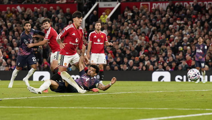 Manchester, England, 10th October 2026. Dominic Solanke of Tottenham Hotspur scores during the Manchester United, ManU vs Tottenham Hotspur Premier League match at Old Trafford, Manchester. Picture credit should read: Andrew Yates Sportimage EDITORIAL USE ONLY. No use with unauthorised audio, video, data, fixture lists, club league logos or live services. Online in-match use limited to 120 images, no video emulation. No use in betting, games or single club league player publications. SPI_047_AY_MANUTD_SPURS SPI-5058-0047