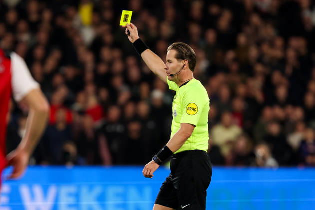 2026-10-10 Feyenoord v AZ Alkmaar - Dutch Eredivisie ROTTERDAM, NETHERLANDS - OCTOBER 10: Referee Danny Makkelie shows the yellow card during the Dutch Eredivisie match between Feyenoord and AZ Alkmaar at Stadion Feijenoord on October 10, 2026 in Rotterdam, Netherlands. Rotterdam Stadion Feijenoord Netherlands Content not available for redistribution in The Netherlands directly or indirectly through any third parties. Copyright: xHansxvanxderxValkx