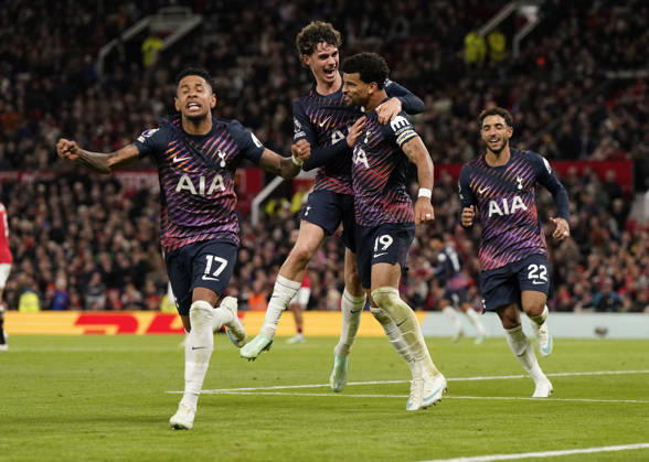 Manchester, England, 10th October 2026. Dominic Solanke of Tottenham Hotspur (C) celebrates after scoring during the Manchester United, ManU vs Tottenham Hotspur Premier League match at Old Trafford, Manchester. Picture credit should read: Andrew Yates Sportimage EDITORIAL USE ONLY. No use with unauthorised audio, video, data, fixture lists, club league logos or live services. Online in-match use limited to 120 images, no video emulation. No use in betting, games or single club league player publications. SPI_051_AY_MANUTD_SPURS SPI-5058-0053