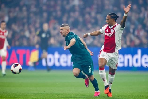 AMSTERDAM , 10-09-2026 , JohanCruyff Arena , season 2026 2027 , Dutch Eredivisie football , Match between Ajax and NEC Nijmegen , picture shows NEC Nijmegen player Bryan Linssen and Ajax player Thilo Kehrer battle for possession Ajax - NEC  x208125188x Copyright: