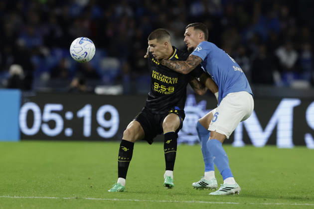 Serie a football match SSC Napoli vs Frosinone Frosinone s Georgian forward Giorgi Kvernadze challenges for the ball with Napoli s Spanish defender Rafa Marin during the Serie A football match between SSC Napoli vs Frosinone at the Diego Armando Maradona Stadium in Naples, southern Italy, on October 10, 2026. _BPH7110 Copyright: xAntonioxBalascox
