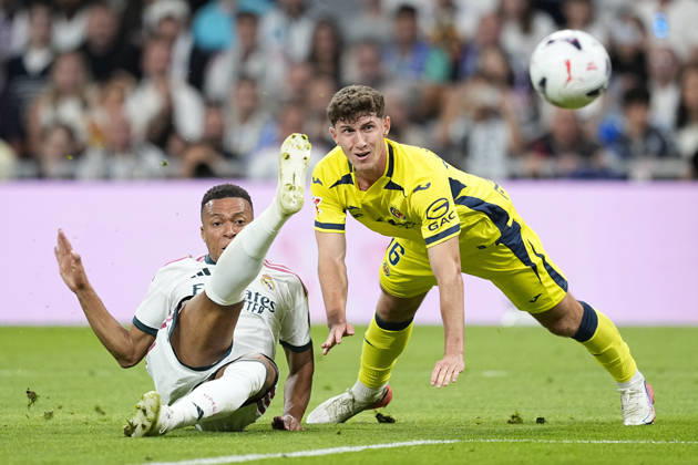 October 10, 2026, Madrid, Madrid, Spain: Kylian Mbappe of Real Madrid CF and Pau Navarro of Villarreal CF in action during the Spanish League, LaLiga EA Sports, football match between Real Madrid and Villarreal CF at Bernabeu stadium on October 10, 2026, in Madrid, Spain. Madrid Spain - ZUMAa181 20261010_zaa_a181_147 Copyright: xOscarxJ.xBarrosox