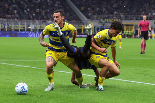 FC Internazionale v Parma Calcio 1913 - Serie A - Season 2026-2027 Milan, Italy, 10th October 2026. Djed Spence of FC Internazionale clashes with Emanuele Valeri and Simone Lontani of Parma Calcio during the FC Internazionale vs Parma Calcio 1913 Serie A match at Giuseppe Meazza, Milan. Picture credit should read: Jonathan Moscrop Milan Stadio Giuseppe Meazza Italy