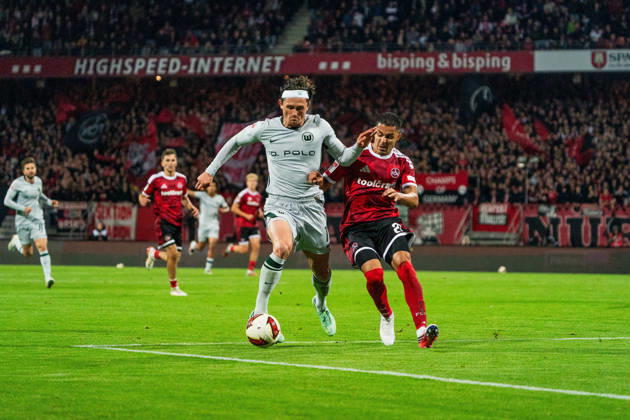 Fabian Reese (VfL Wolfsburg, 11) und Ioannis Masouras (1. FC Nuernberg, 21), GER, 1. FC Nuernberg vs. VfL Wolfsburg, Fussball, 2. Bundesliga, 7. Spieltag, Saison 2026 2027, 10.10.2026, DFL REGULATIONS PROHIBIT ANY USE OF PHOTOGRAPHS AS IMAGE SEQUENCES AND OR QUASI-VIDEO, GER, 1. FC Nuernberg vs. VfL Wolfsburg, Fussball, 2. Bundesliga, 7. Spieltag, Saison 2026 2027, 10.10.2026 Nuernberg Copyright: xEibner-Pressefoto MaxxVogelx EP_MVL