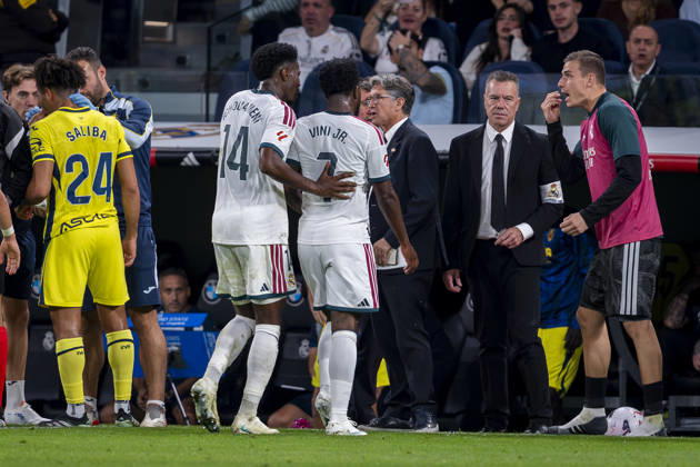 Real Madrid CF v Villarreal CF - LaLiga EA Sports 2026 27 Vinicius Junior of Real Madrid CF (C) is escorted off the pitch by his teammates after being sent off during the LaLiga EA Sports football match between Real Madrid CF and Villarreal CF at Estadio Bernabeu on October 10, 2026 in Madrid, Spain. Madrid Estadio Bernabeu Madrid Spain Copyright: xAlbertoxGardinx AGardin_20261010_Rea_Mad_Vil_0260