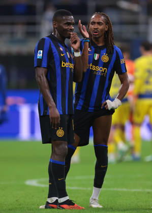 FC Internazionale v Parma Calcio 1913 - Serie A - Season 2026-2027 Milan, Italy, 10th October 2026. Djed Spence of FC Internazionale discusses with team mate Ange-Yoan Bonny following the FC Internazionale vs Parma Calcio 1913 Serie A match at Giuseppe Meazza, Milan. Picture credit should read: Jonathan Moscrop Milan Stadio Giuseppe Meazza Italy