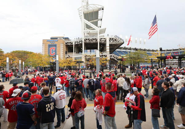 Baseball fans wait to enter Progressive Field before an MLB, Baseball Herren, USA American League Division Series playoff game between the Cleveland Guardians and the Chicago White Sox in Cleveland, Ohio, on Saturday, October 10, 2026.  CLE20261010701 AARONxJOSEFCZYK