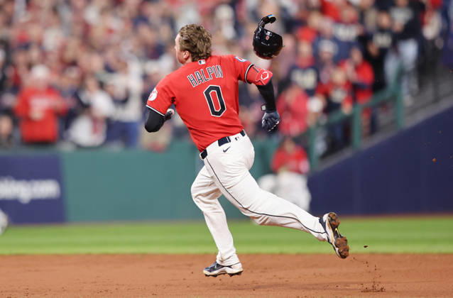 Cleveland Guardians Petey Halpin (0) tries to stretch a double into a triple against the Chicago White Sox in the fifth inning of an MLB, Baseball Herren, USA American League Division Series at Progressive Field in Cleveland, Ohio, on Saturday, October 10, 2026. Halpin was tagged out at third by Chicago White Sox third baseman Miguel Vargas.  CLE20261010728 AARONxJOSEFCZYK