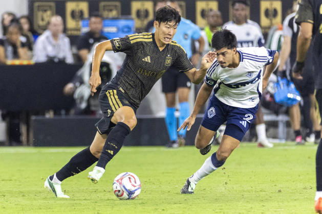October 10, 2026, Los Angeles, California, USA: Los Angeles FC attacking midfielder Heung Min Son (7) and Vancouver Whitecaps centre back Mathias Laborda (2) vie for the ball during a MLS, Fussball Herren, USA soccer game on Saturday, Oct. 10, 2026 in Los Angeles. Los Angeles USA - ZUMAc68_ 20261010_zaf_c68_033 Copyright: xRingoxChiux
