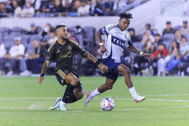 October 10, 2026, Los Angeles, California, USA: Denis Bouanga 99 of the Los Angeles Football Club falls as he and Edier Ocampo 18 of the Vancouver Whitecaps struggle for possession of the ball during their regular season MLS, Fussball Herren, USA game on Saturday October 10, 2026 at the BMO Stadium in Los Angeles, California. ARIANA RUIZ PI LAFC Vs. Whitecaps - ZUMAp124 20261010_zaa_p124_011 Copyright: xArianaxRuizx