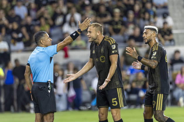 October 10, 2026, Los Angeles, California, USA: Los Angeles FC centre back Ryan Porteous (5) and striker Denis Bouanga (99) complaint a call during a MLS, Fussball Herren, USA soccer game against the Vancouver Whitecaps on Saturday, Oct. 10, 2026 in Los Angeles. Los Angeles USA - ZUMAc68_ 20261010_zaf_c68_058 Copyright: xRingoxChiux